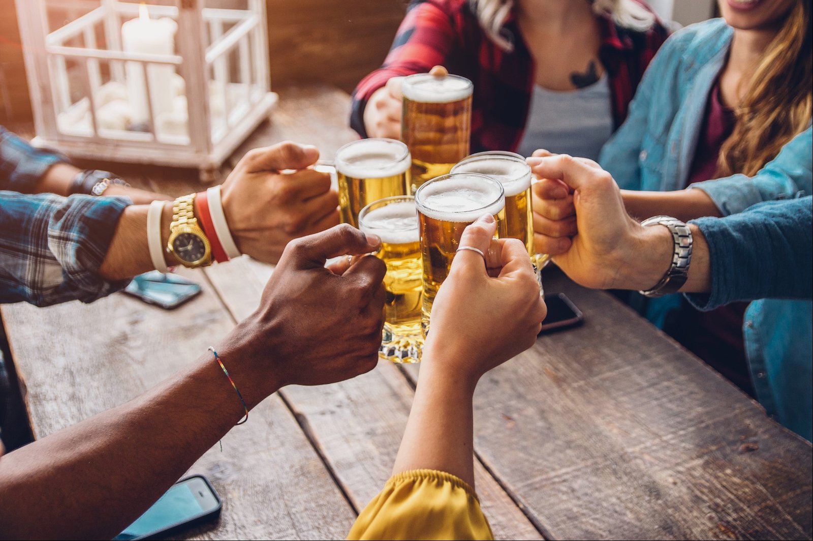 group-people-enjoying-toasting-beer-brewery-pub-friendship-concept-with-young-people-having-fun-together